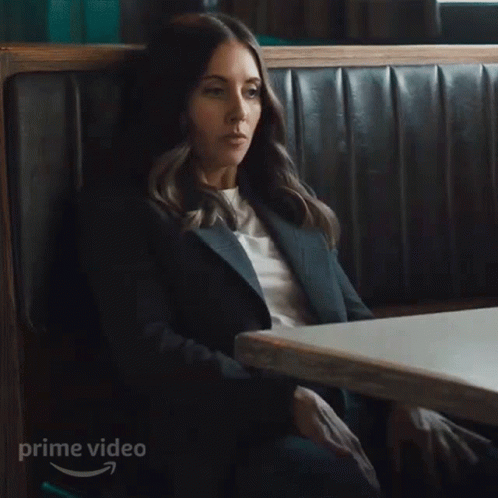 Woman Sitting At Table With Prime Video GIF
