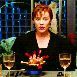 Woman Sitting At Table With Two Wine Glasses GIF