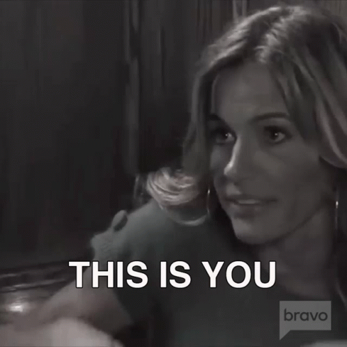 Woman Sitting by Candle Saying This Is You