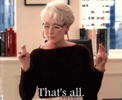 Woman Sitting Crossed Fingers Saying Thats All GIF