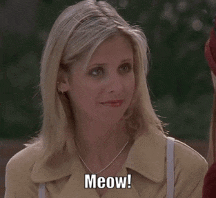 Woman Sitting Down Says Meow