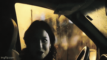 Woman Sitting in Car