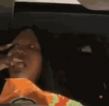 Woman Sitting In Car With Bag Of Chips GIF