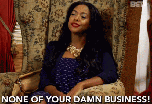 Woman Sitting in Chair Saying None of Your Damn Business