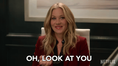 Woman Sitting in Chair Saying Oh Look at You