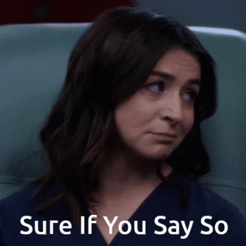 Woman Sitting in Chair Saying Sure If You Say So