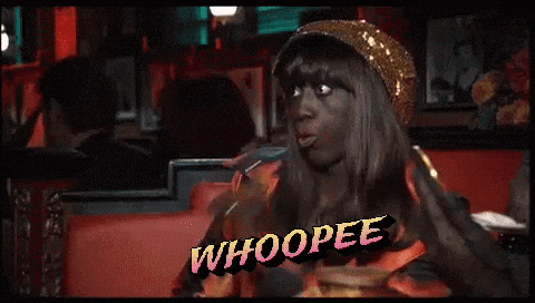 Woman Sitting in Chair Saying Whoopee