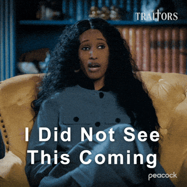 Woman Sitting in Chair Shocked I Did Not See This Coming