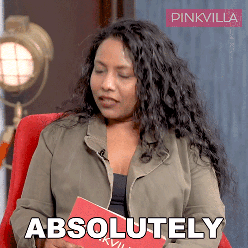 Woman Sitting in Chair With Book and Absolutely