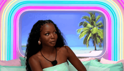 Woman Sitting In Front Of Cheley Window GIF