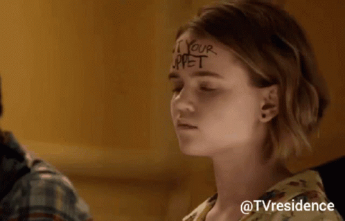 Woman Sitting In Front Of Crowd With Caption @Tvresidence GIF