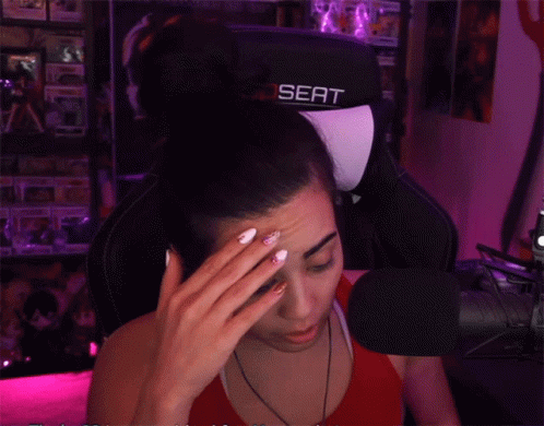 Woman Sitting in Front of Microphone Holy Shot
