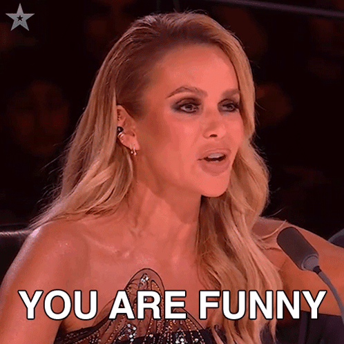 Woman Sitting in Front of Microphone Saying You Are Funny