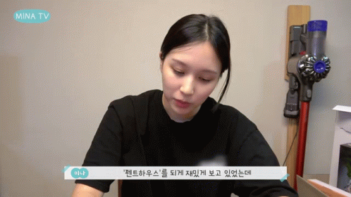 Woman Sitting In Front Of Vacuum GIF