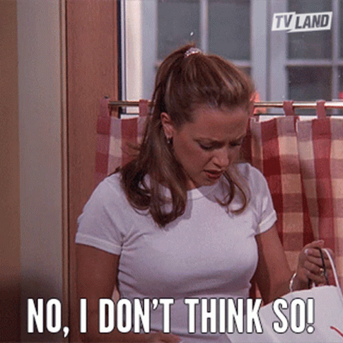 Woman Sitting in Front of Window Saying No I Don't Think So