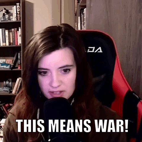 Woman Sitting in Red Chair This Means War