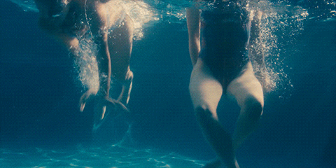 Woman Sitting In The Pool GIF