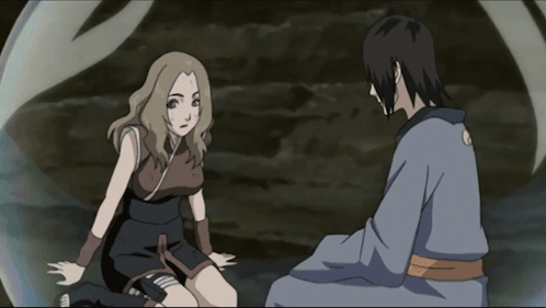Woman Sitting Next to Man With Ici Ca Devrait Aller