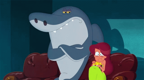 Woman Sitting Next to Shark Mouth Open
