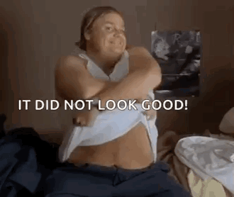 Woman Sitting On Bed Removing Shirt GIF