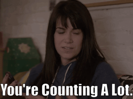 Woman Sitting On Bed Saying You're Counting A Lot GIF