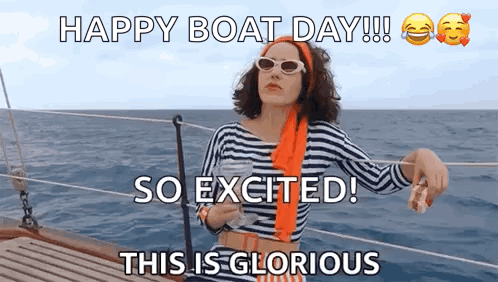 Woman Sitting on Boat Holding Wine and Sunglasses