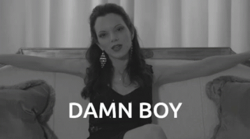 Woman Sitting on Couch Arms Outstretched Damn Boy
