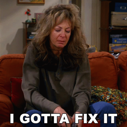 Woman Sitting On Couch Saying I Gotta Fix It GIF