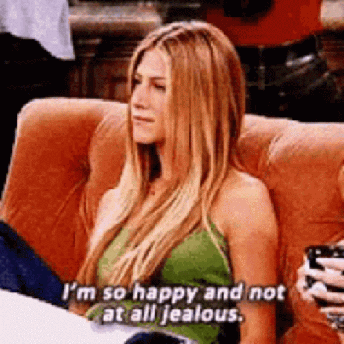 Woman Sitting on Couch Saying Im Not Jealous
