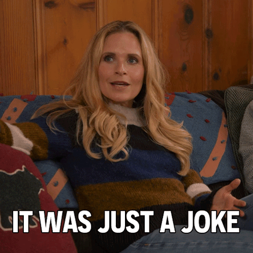 Woman Sitting on Couch Saying It Was Just a Joke
