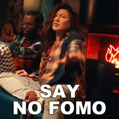 Woman Sitting on Couch Saying No Fomo