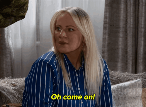 Woman Sitting On Couch Saying Oh Come On GIF