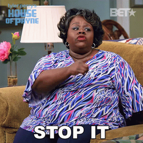 Woman Sitting on Couch Saying Stop It