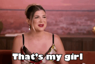 Woman Sitting on Couch Saying That's My Girl