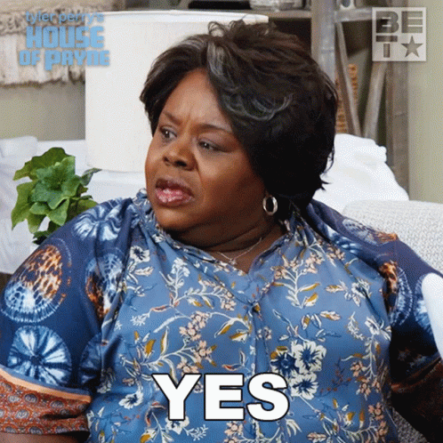 Woman Sitting on Couch Saying Yes