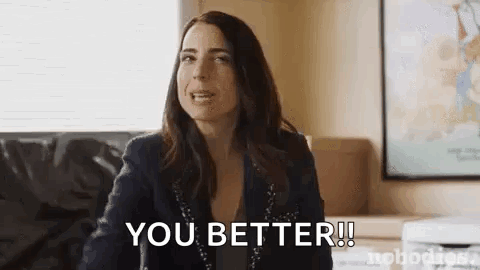 Woman Sitting On Couch Saying You Better GIF