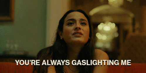 Woman Sitting on Couch Saying You're Always Gaslighting Me