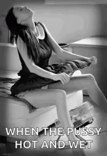Woman Sitting on Couch Taking Off Dress