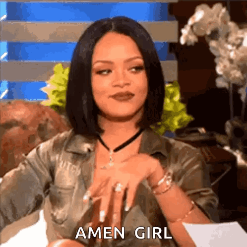 Woman Sitting on Couch With Amen Girl