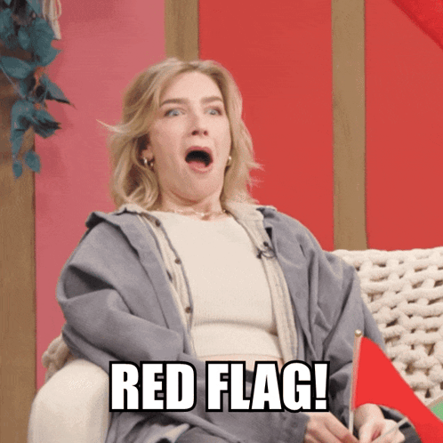 Woman Sitting on Couch With Open Mouth