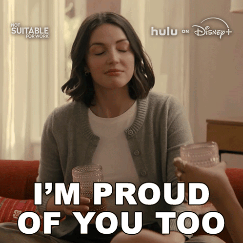 Woman Sitting On Couch With Two Glasses Saying I'm Proud Of You Too GIF