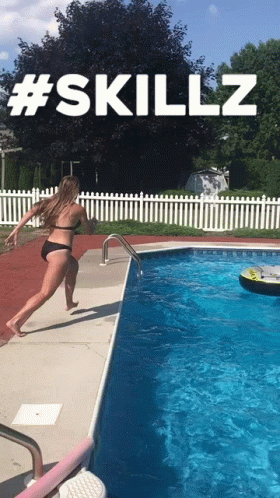 Woman Sitting on Inflatable Hippo in Pool