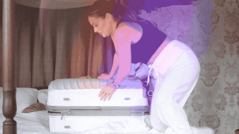 Woman Sitting On Suitcase Packing Bag GIF