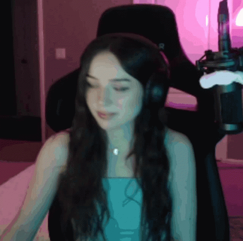 Woman Sitting with Headphones