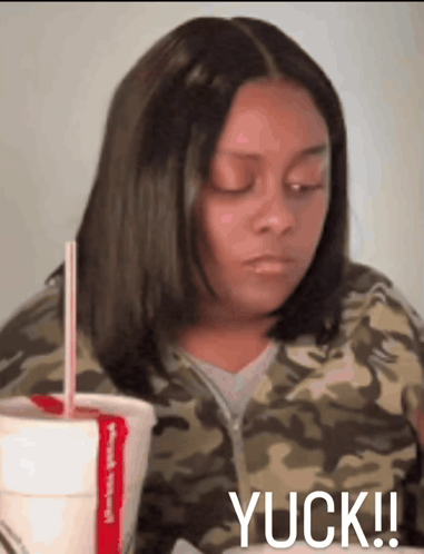 Woman Sitting with Soda and Yuck
