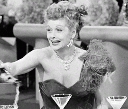 Woman Sitting With Three Martini Glasses GIF