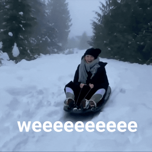 Woman Sledding Down Snowy Hill Weee