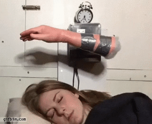 Woman Sleeping Near Alarm Clock