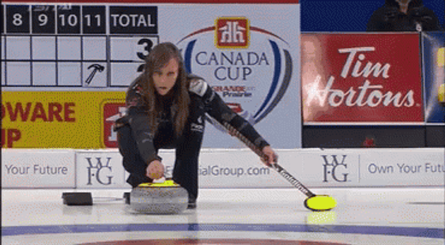 Woman Sliding With Curling Stone GIF