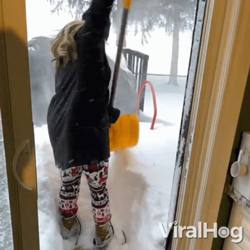 Woman Slips While Snowing GIF